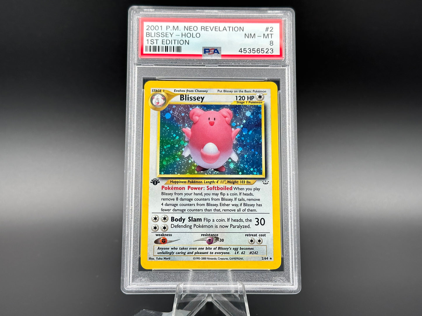 Blissey holo error 1. Edition Neo Revelation PSA 8